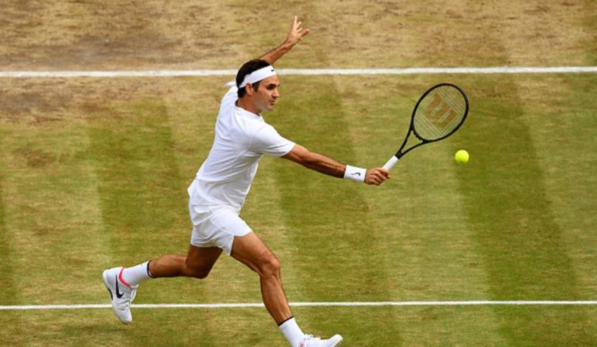 Roger Federer jogando em Wimbledon; torneio agora é só do SporTV