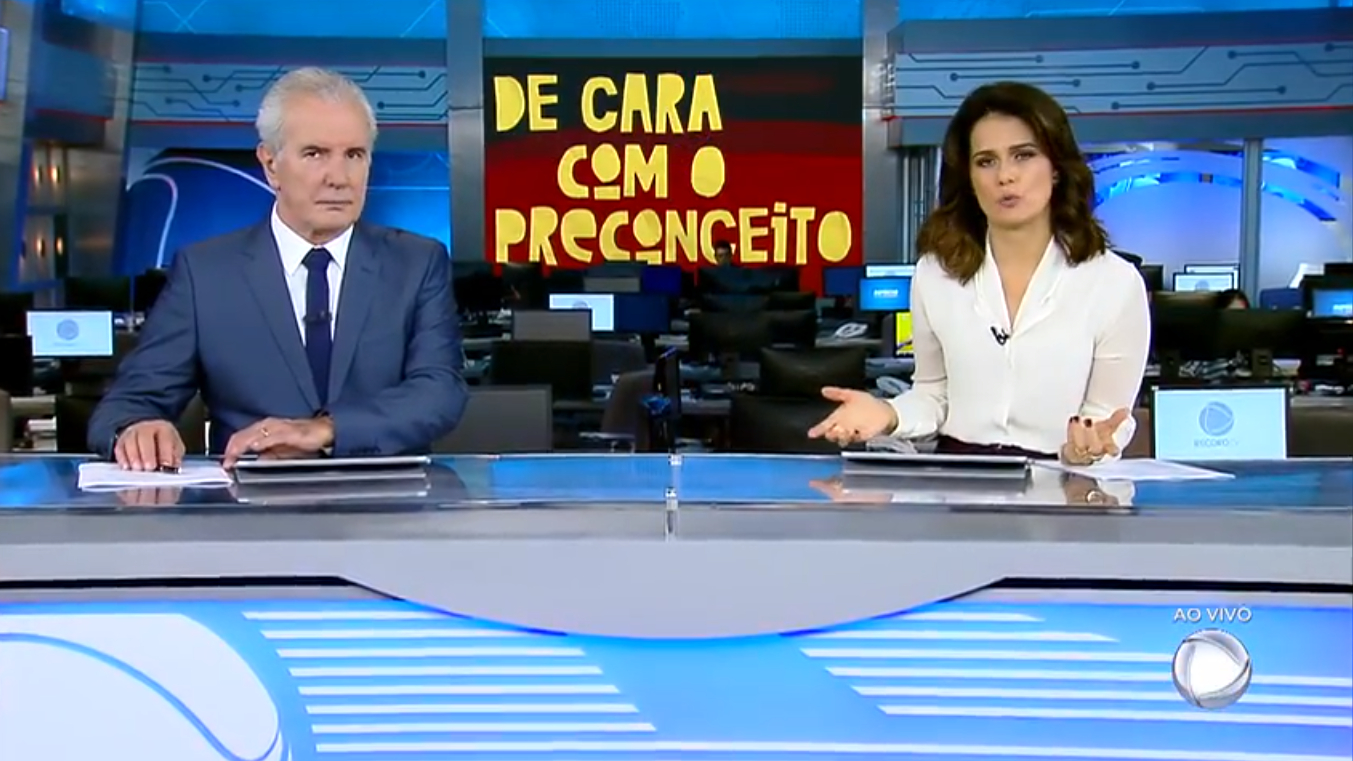 Celso Freitas e Adriana Araújo apresentando o Jornal da Record