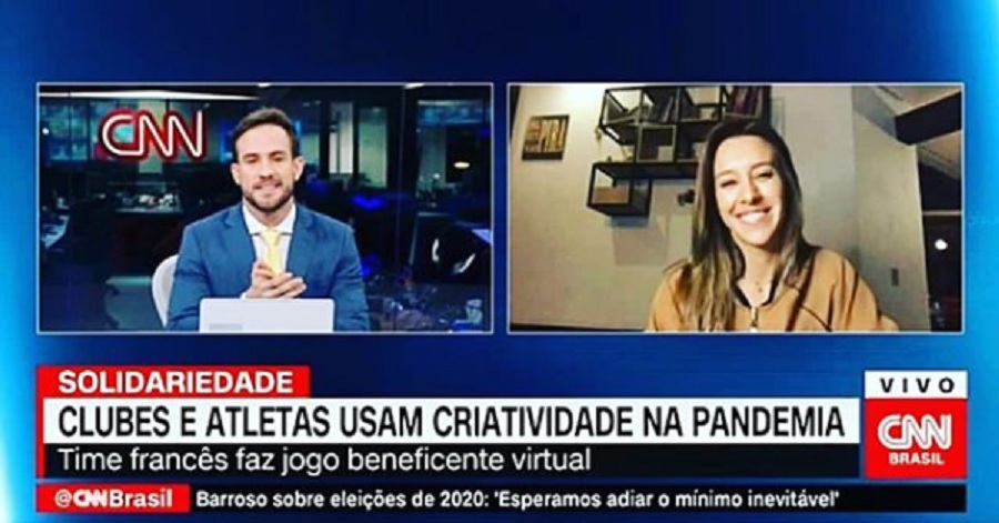 Cris Dias com Daniel Adjuto, no Jornal da CNN