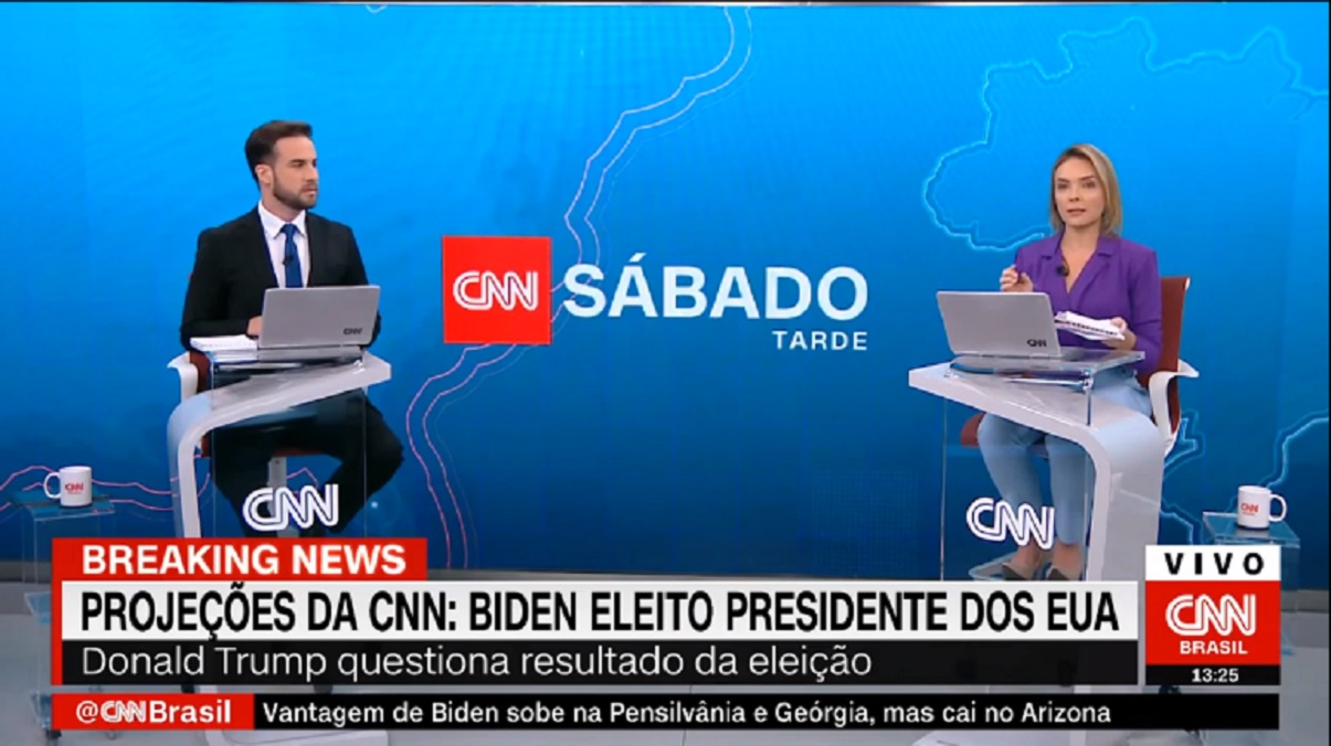 Daniel Adjuto e Taís Lopes anunciam a vitória de Biden, nos EUA